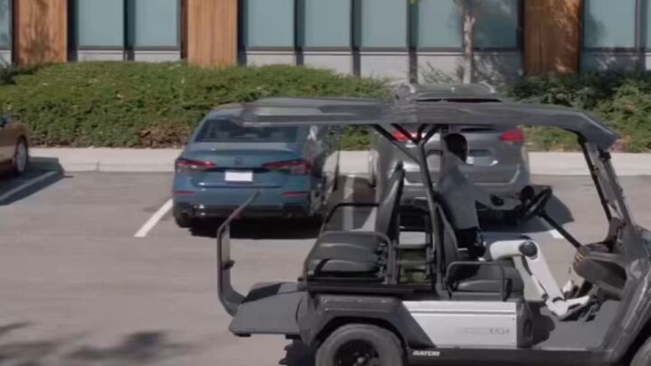 Figure F.03 humanoide au volant d une voiture avec poignee sur le volant