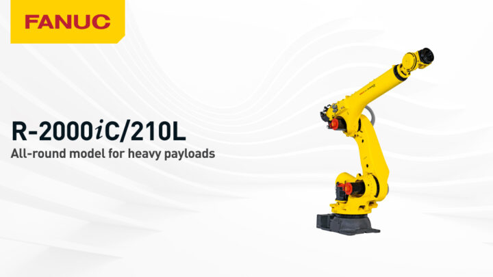 Robot industriel FANUC R-2000iC/210L jaune dans une cellule de manutention