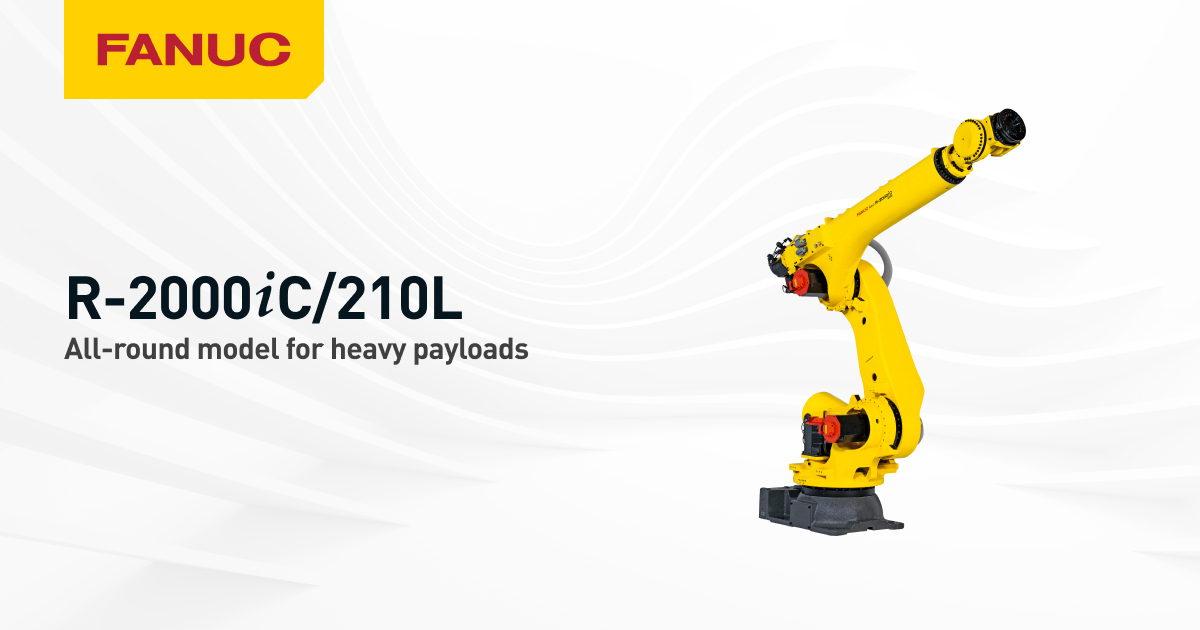 Robot industriel FANUC R-2000iC/210L jaune dans une cellule de manutention